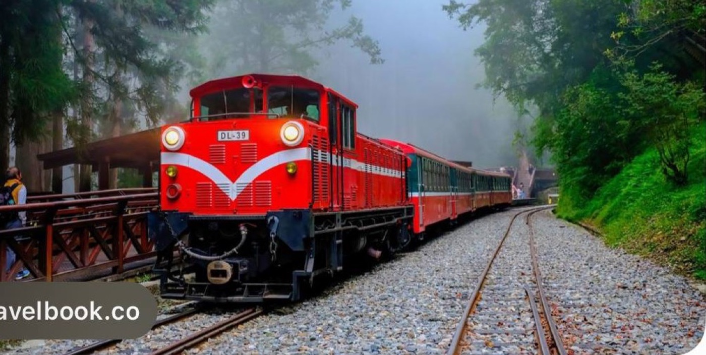 Red forest railway train in misty Alishan