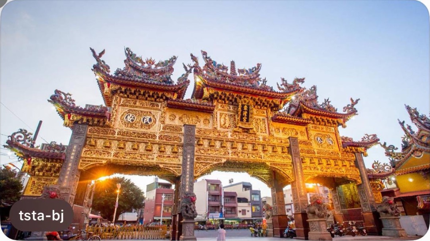 Golden ceremonial gateway at Donglong Temple